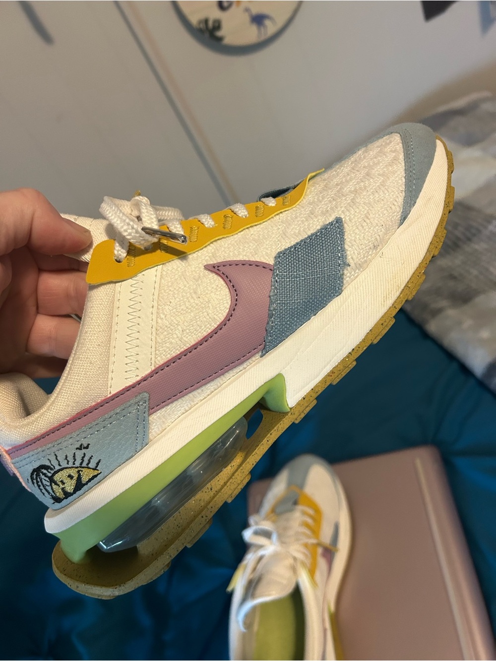 Nike Women’s Multi-Color Casual Sneaker in White, Pink, Blue & Yellow